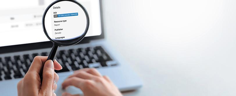 Computer screen displaying the report "An overview of publishers’ guidelines for sharing research data" on Zenodo